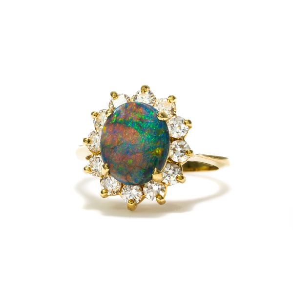 The Gem Garden North County San Diego Finest Jewelry And Gemstone Store. 18KY Gold Australian Black Opal with Red Pattern Ring with Diamonds